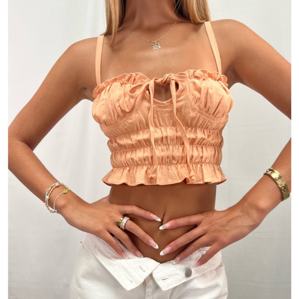 Isabelle’s Cabinet orange crop top